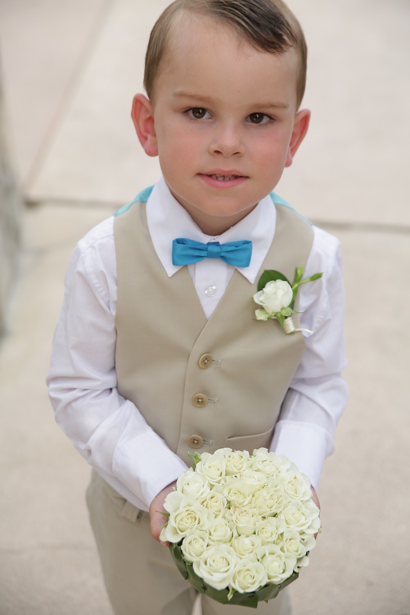 ringbearer with white flower ring box elena damy floral design mexico