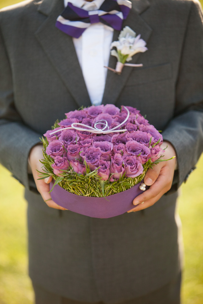 purple ring bearer boutonniere fresh rosemary and roses
