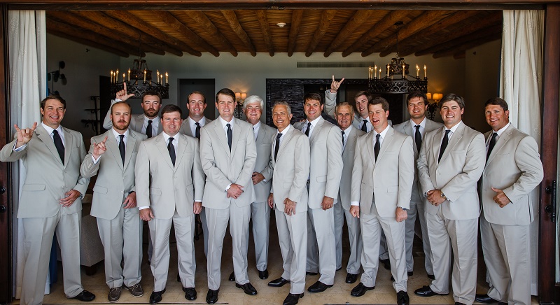 groom and his groomsmen in suits beach destination weddings mexico