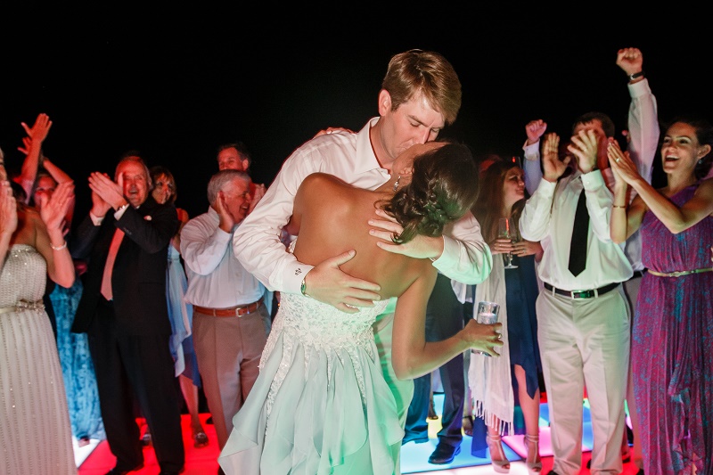 bride and groom kiss dance floor destination weddings mexico elena damy