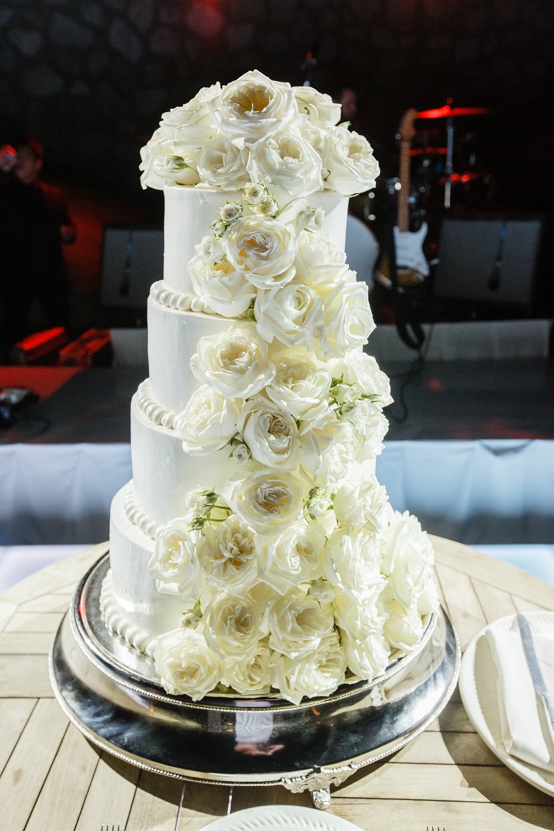white wedding cake with fresh flowers mexico destination weddings elena damy