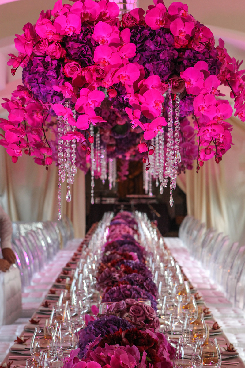 hanging orchid centerpiece long feast style table for events elena damy floral design