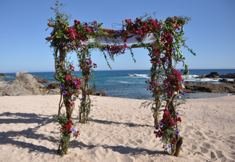 red and purple flowers beach weddings mexico elena damy floral design los cabos 10