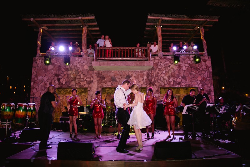 after party dancing on the stage beach weddings los cabos esperanza resort elena damy event design chris plus lynn photography