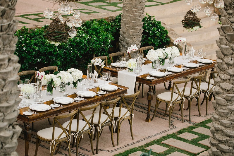 white floral centerpieces beach weddings los cabos esperanza resort elena damy event design chris plus lynn photography