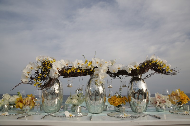 metallic vases yellow orchids beach wedding mexico elena damy chris plus lynn