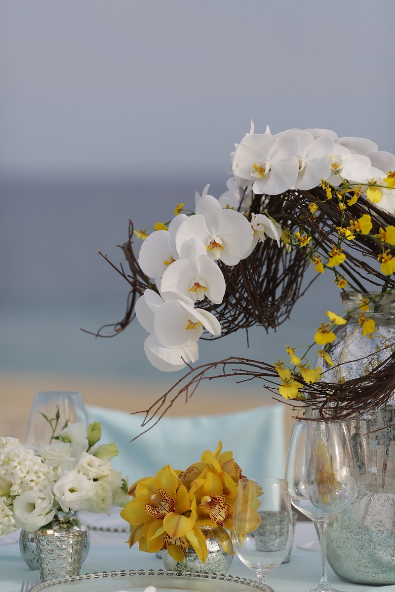 modern floral arrangements destination weddings elena damy chris plus lynn yellow orchids aqua linens