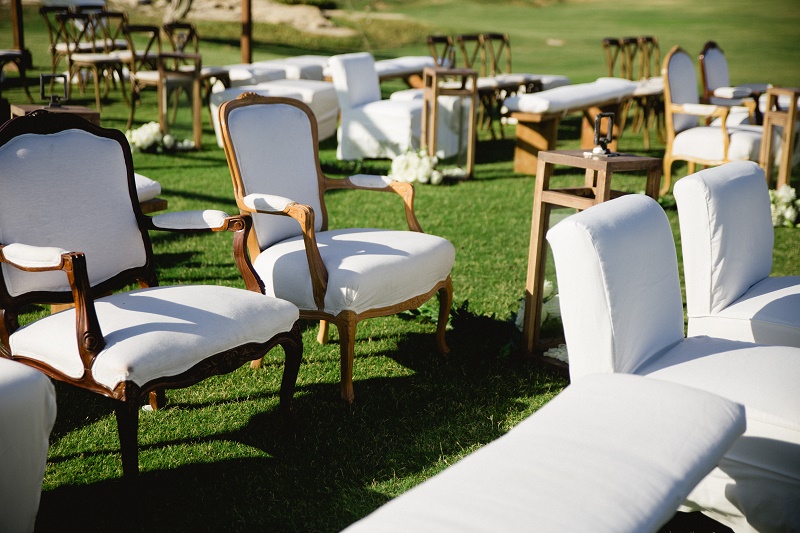 white upholstered furniture wedding ceremony weddings at cabo del sol elena damy destination wedding planners mexico chris plus lynn photo