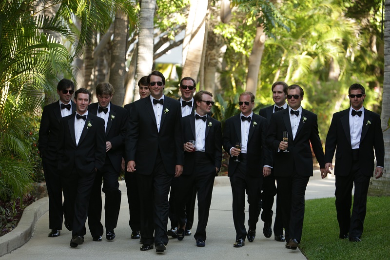 groom groomsmen walking to ceremony Cabo Weddings One and Only Palmilla Elena Damy Event Design Cabo Chris Plus Lynn Photo