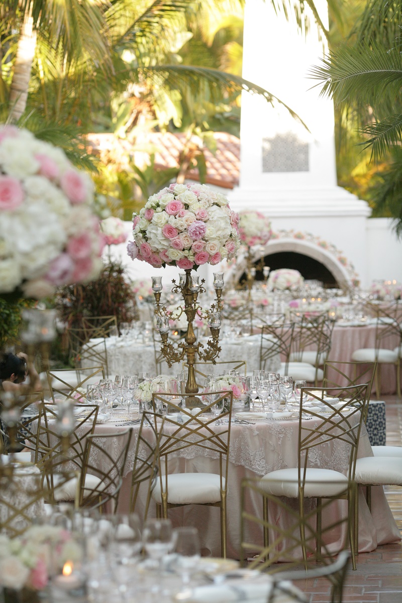 wedding reception on terraces pink flowers Cabo Weddings One and Only Palmilla Elena Damy Event Design Cabo Chris Plus Lynn Photo