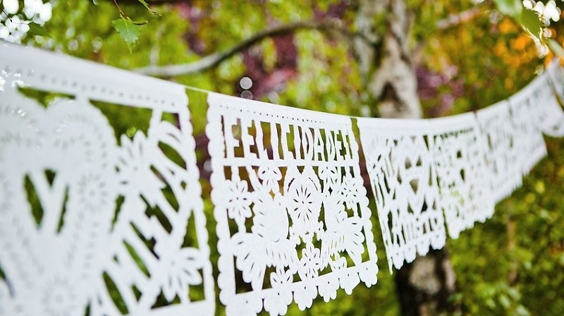 white papel picado banners mexican weddings baja weddings elena damy destination weddings