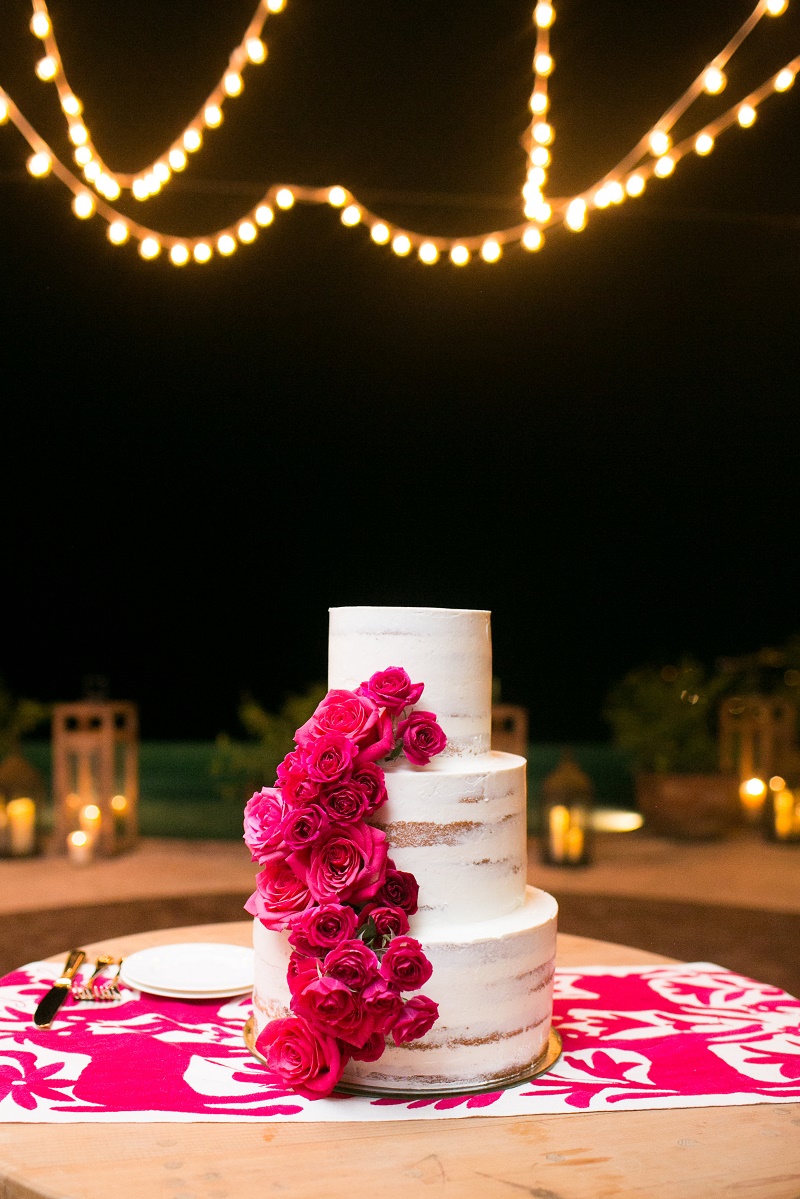 three-tier-stacked-wedding-cake-with-hot-pink-roses-cabo-weddings-casa-turquesa-los-cabos-destination-weddings