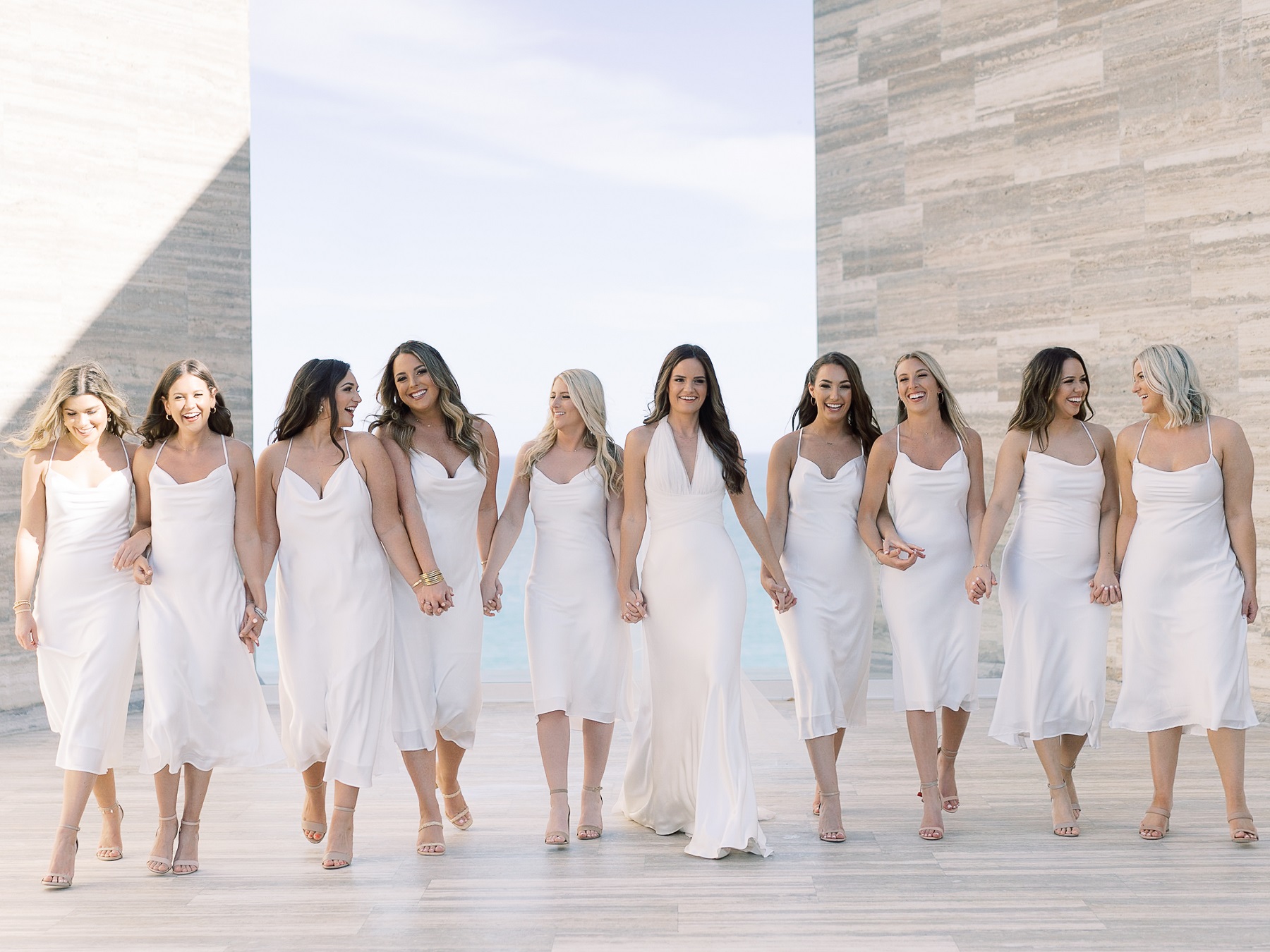 bridesmaids wearing white solaz wedding