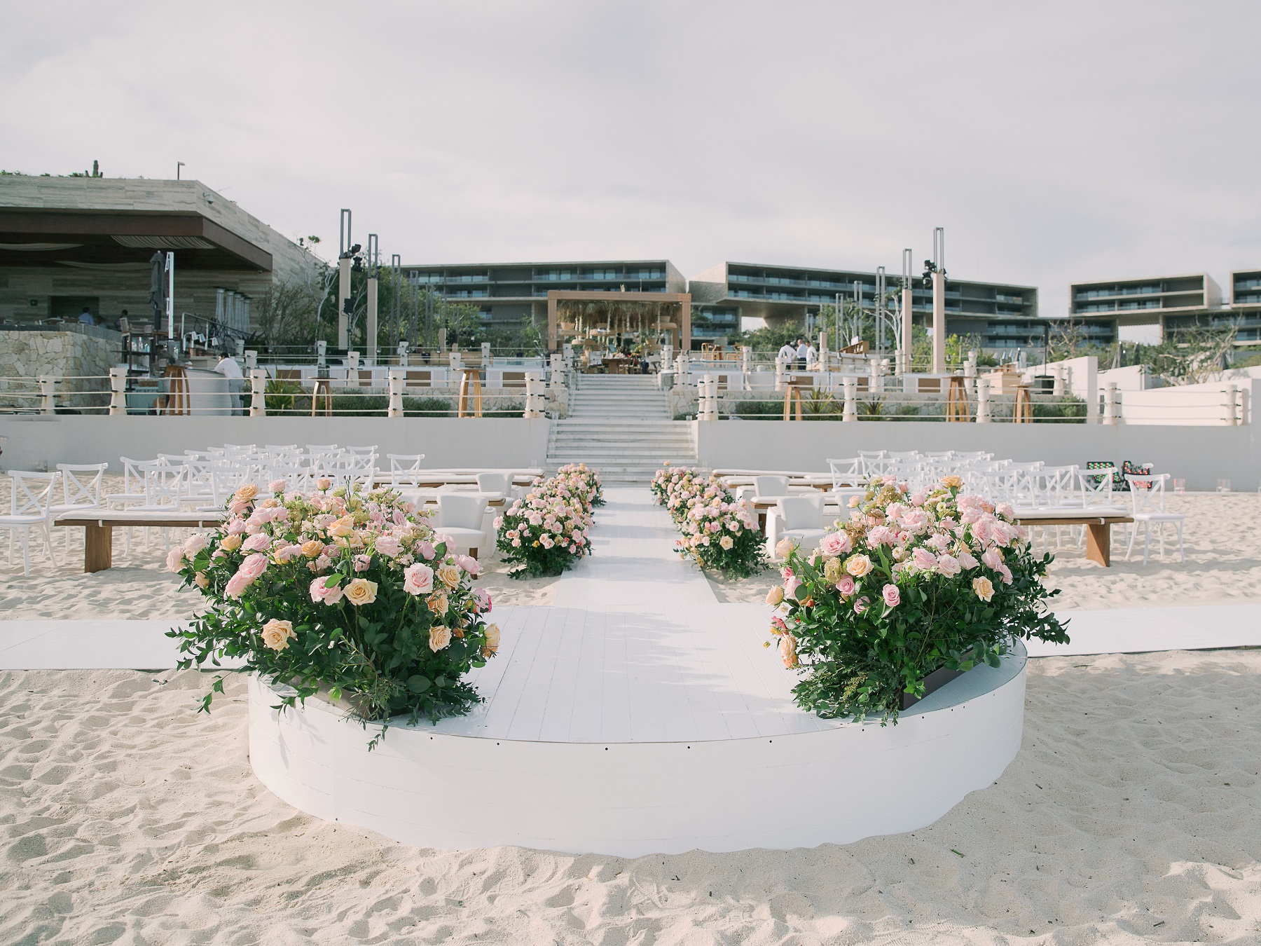 outdoor wedding ceremony pink roses cabo wedding