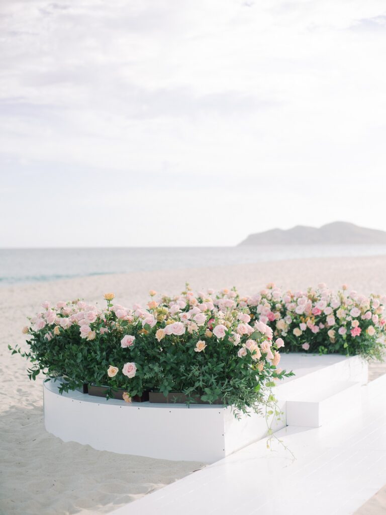 pink and white wedding ceremony decor cabo